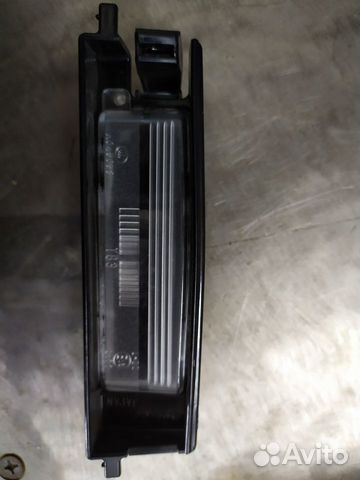 Фонарь освещения номерного знака