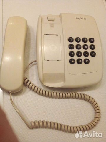 Телефон кнопочный