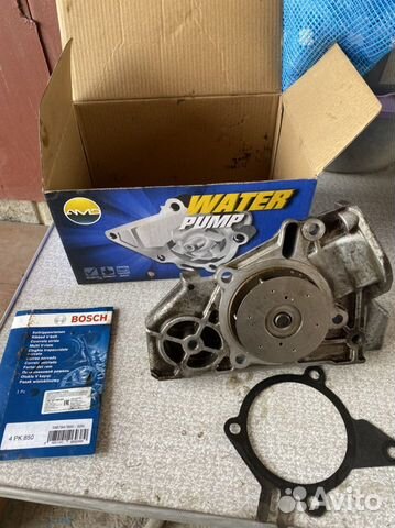 Водяной насос Kia Spectra