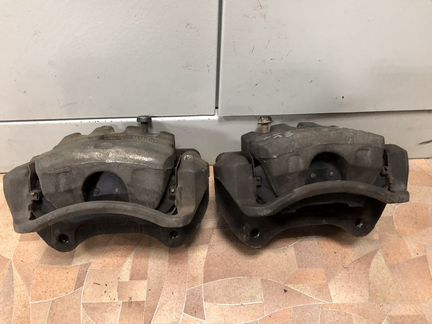 Суппорт передний Опель Астра j Gtc