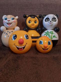 Неваляшки музыкальные и матрёшки в ассортименте