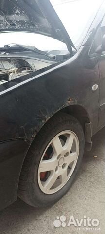 Крыло переднее левое lancer 9