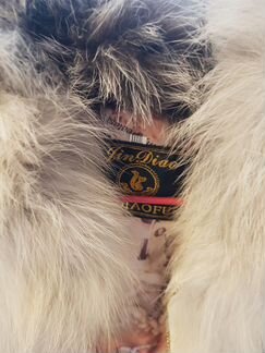 Меховая жилетка