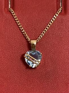 Золотая подвеска с топазом